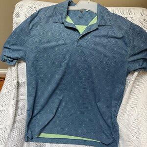 Nike Golf DriFit Men’s Large shirt. Blue with green lining. Great condition!